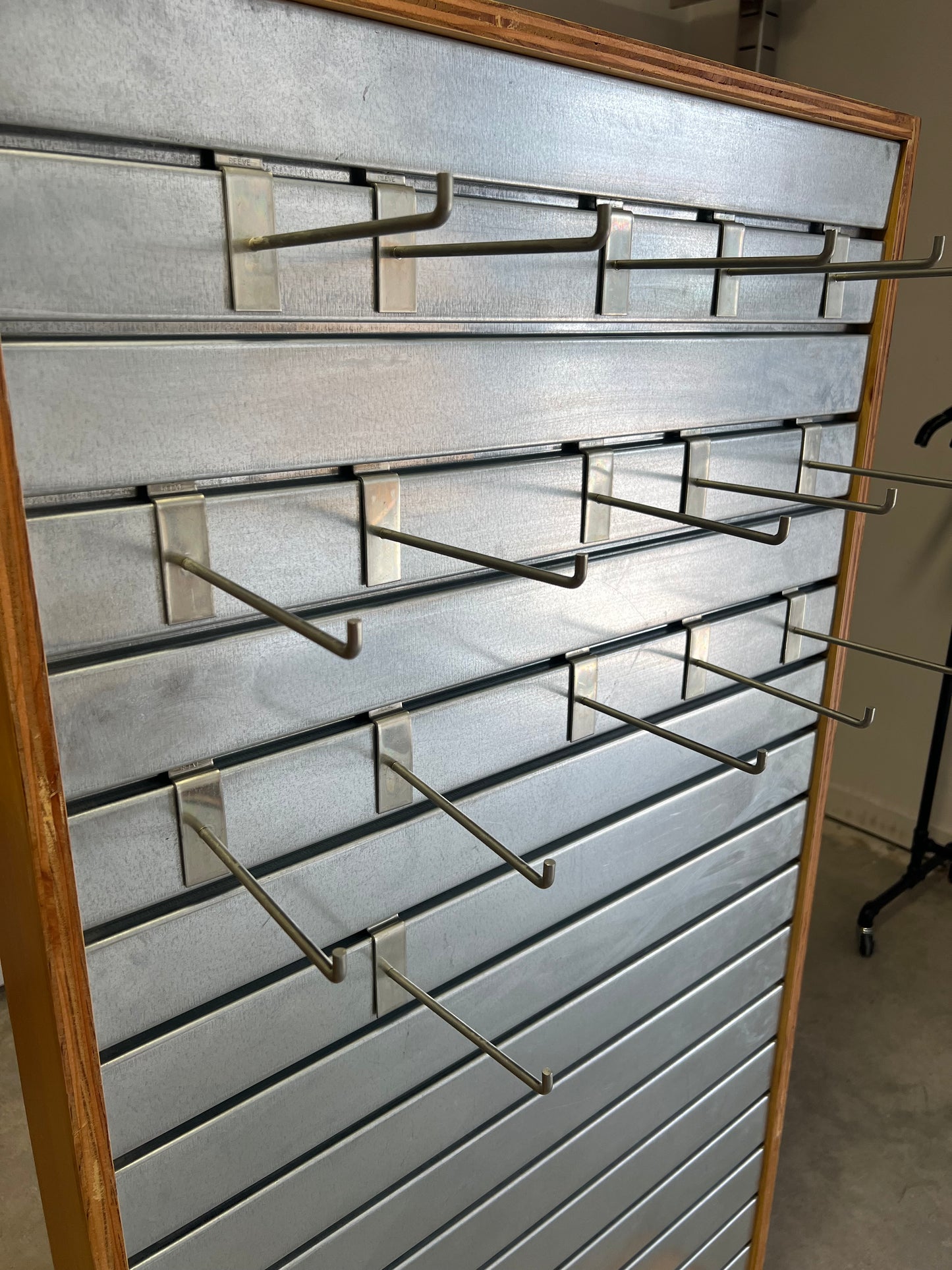 Double Hook on a Metal Slat Wall